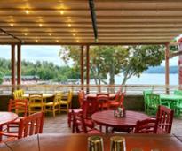 patio dining at rooftop cabana bar at surfside on the lake