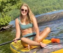 teen girl on standup paddleboard