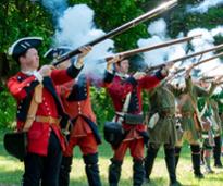 fort william henry reenactor soldiers fire guns
