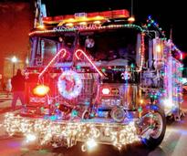 fire truck lit up with Christmas lights