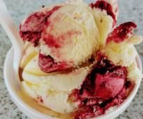 raspberry cheesecake ice cream in a dish