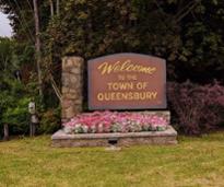 welcome to the town of queensbury sign