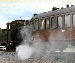 Train traveling on tracks