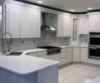 kitchen with all white countertops and cabinets