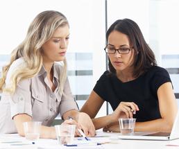 two women having a marketing meeting