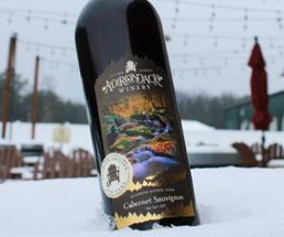 wine bottle in the snow