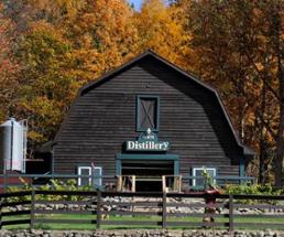 farm distillery surrounded by fall foliage