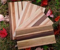 wooden cutting boards on the grass 