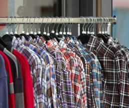 rack with plaid shirts