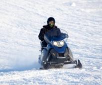 person on a snowmobile