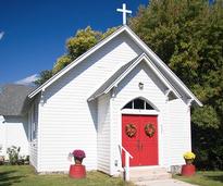 white church with red doors