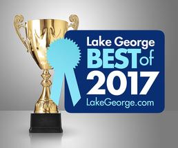 golden cup with best of badge