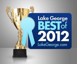 golden cup with best of badge