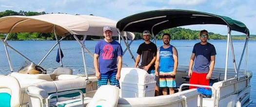 four guys on a boat rental on saratoga lake