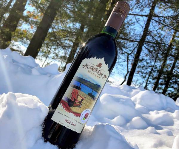 bottle of wine in the snow