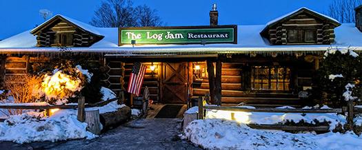 exterior of the log jam restaurant in winter