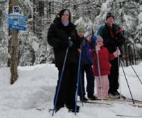 family of skiers