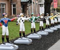 jockey statues in front of national museum of racing