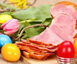 sliced ham with colored easter eggs