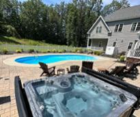exterior of saratoga house rental with hot tub and pool