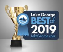 trophy with 2019 best of lake george badge