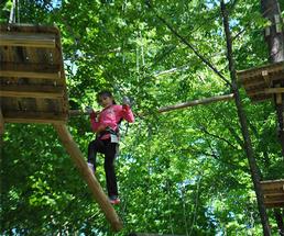 girl on an aerial adventure course