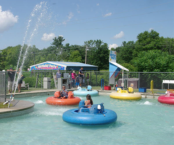 people in water boats at funplex funpark