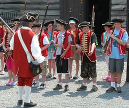 kids participating in a reenactment at fort william henry