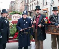 men posing at troy victorian stroll