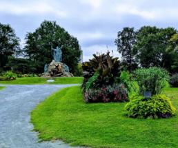 plants and statues in a city park