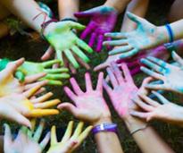 colored hands posing together