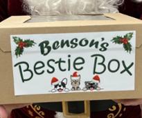 Santa holding a Benson's Bestie Box