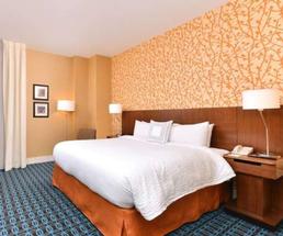 a bed and guest room in a hotel