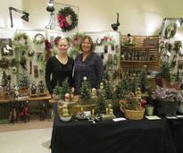 two women at holiday market booth