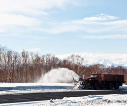 snowplow clearing a highway