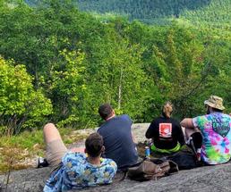 group on a mountain summit