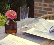 table set up for patio dining at park and elm