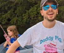 dad fishing with daughter