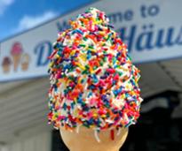 ice cream cone with rainbow sprinkles from dairy haus