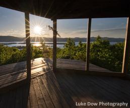 sunset behind a gazebo in lake george