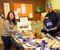 people getting ready for small business saturday with totebags and whatnot