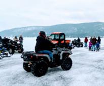 atv and people on lake