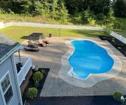 aerial view of pool in a backyard