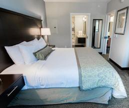 side view of bed in a hotel guest room