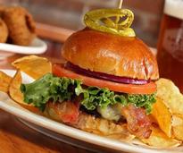 burger and chips on a plate