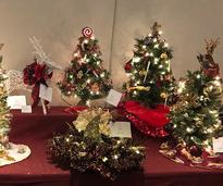 small decorated trees on a table