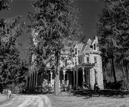 black and white photo of an old house