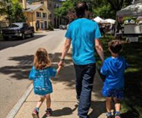 dad walks with kids in glens falls near larac
