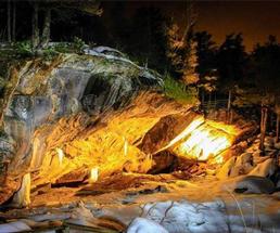 natural stone bridge and caves at night