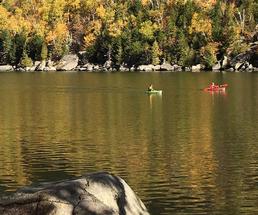 couple kayaking in the fall